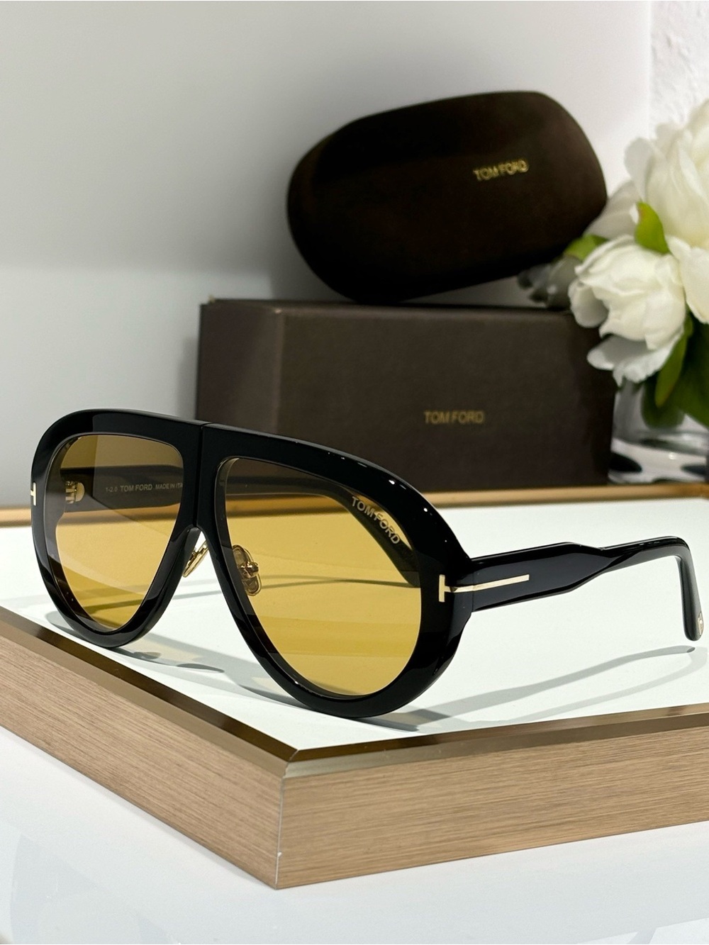 Tom Ford Black Frame Sunglasses with Yellow Lenses and Gold Accents